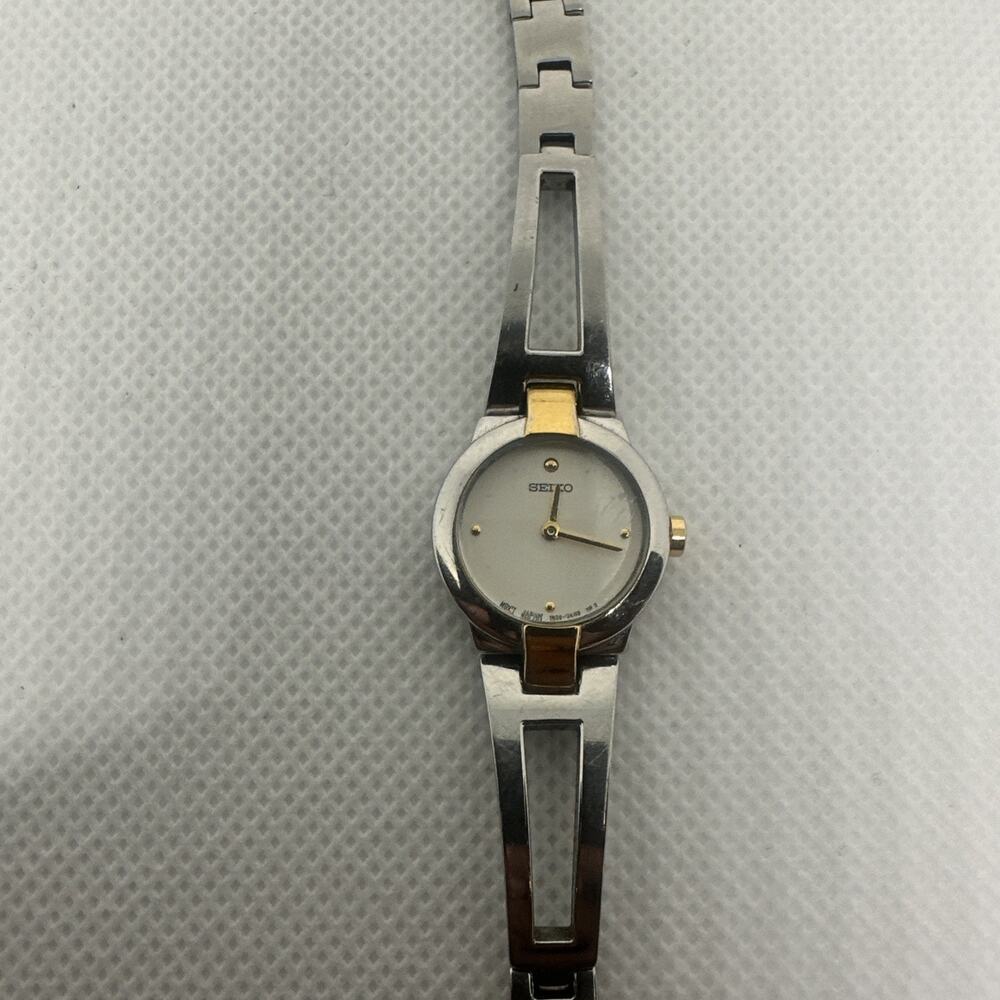 Seiko SUJ704 Womens Dress Two-Tone Stainless Steel Bangle White Dial Watch